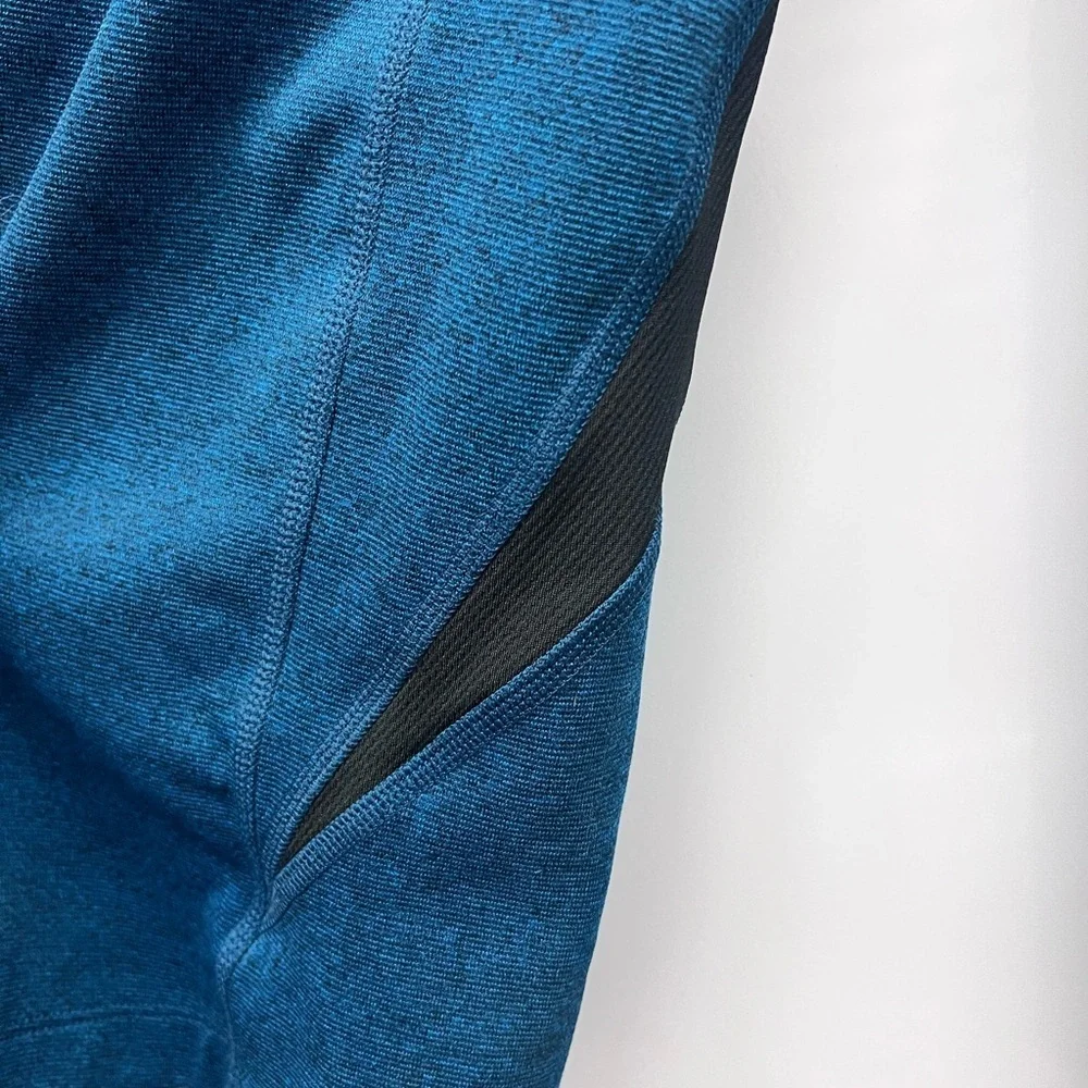 The North Face teal blue quarter zip pullover size M